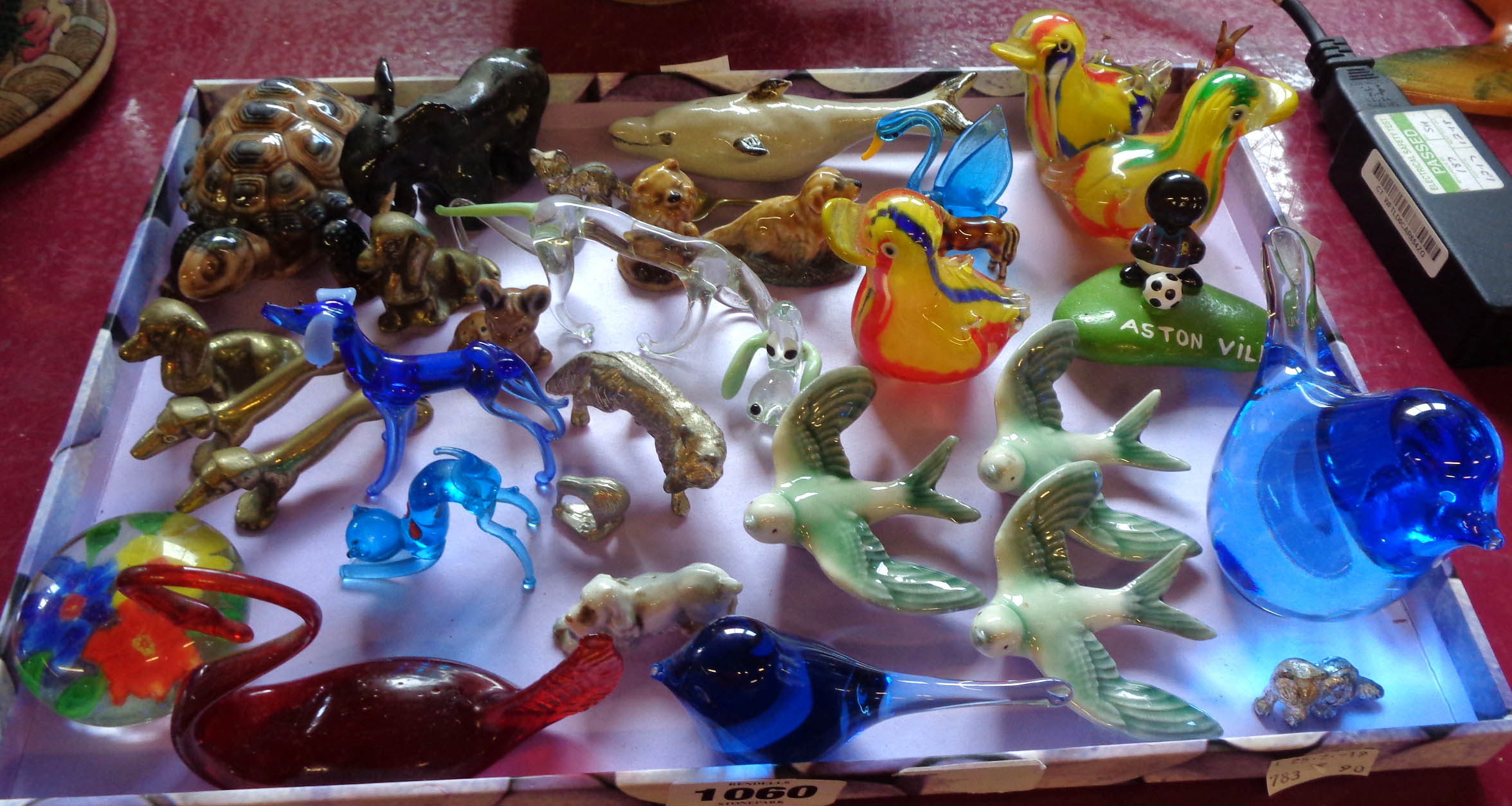 A collection of miniature animals including Murano, Wade, etc.