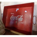 A vintage style Coca Cola advertising tray