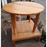A pine circular table - sold with two other tables - various condition