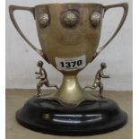 A silver plated running trophy cup for Glasgow Territorial Force Sports 1910, set on an ebonised