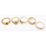 Five hallmarked 375 gold rings - various styles and age