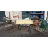A set of four Belgian folding bistro chairs and another - sold with a similar table