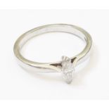 A British hallmarked 950 (platinum) marquise diamond solitaire ring