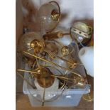 A quantity of brass and glass light fittings