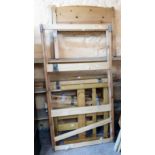 Three modern polished pine 3' bedsteads of varying design all with side rails and slats