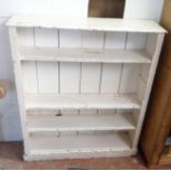 A 3' 5 1/4" Victorian later painted pine four shelf open bookcase, set on plinth base