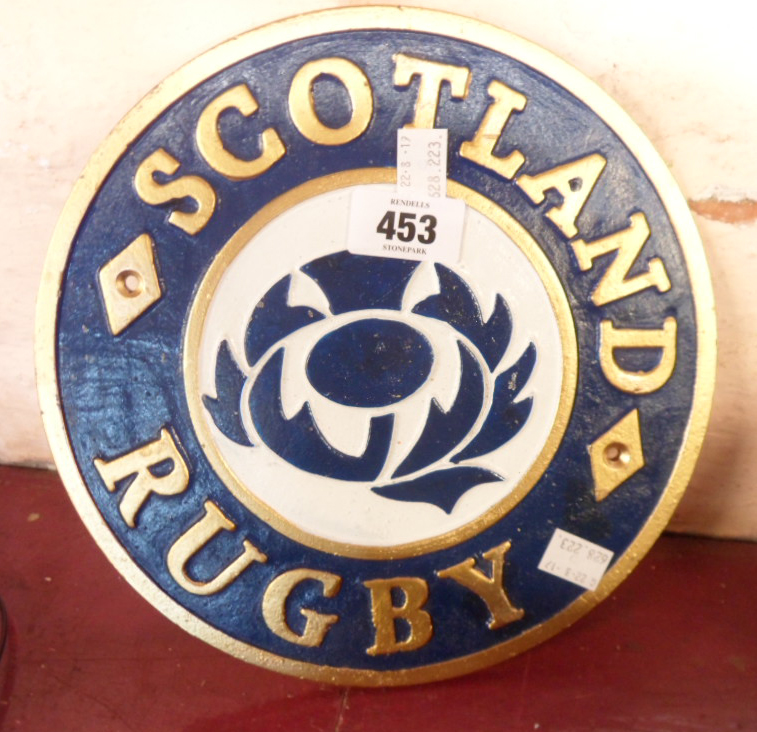 A modern reproduction painted cast iron Scotland Rugby sign