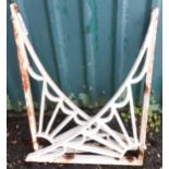 Two small Victorian painted cast iron sunburst brackets