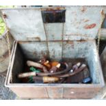 A metal box containing a quantity of tools including files, planes etc.