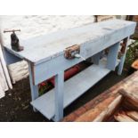 A painted pine workbench fitted with a Record No. 50 vise and a Hilmor PV1 pipe vise