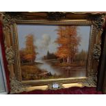 C. Norton: an ornate gilt framed oil on board, depicting an autumnal river landscape scene - signed