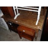 A 4' Victorian pine kitchen table set on turned legs