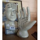 A modern reproduction phrenology head and palmistry hand