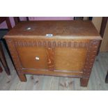 A 24" 20th Century polished oak locker chest with partitioned interior and tray