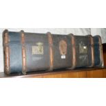 A bentwood bound canvas clad travelling trunk
