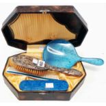A cased vintage pearlised hand mirror brush and comb set - sold with a damaged silver backed brush