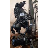 A patinated tin Marly style horse group