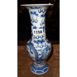 An antique Chinese blue and white baluster vase depicting air dragons chasing a flaming pearl - neck