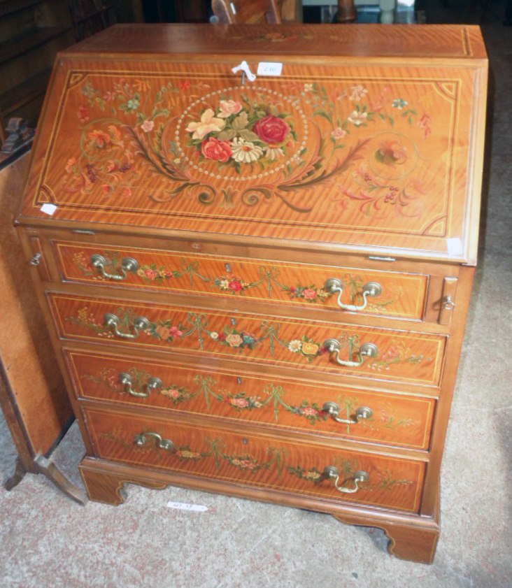 A 30" early 20th Century painted and lined satin birch bureau with profuse floral bouquet and swag