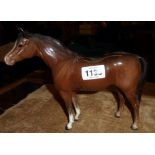 A ceramic bay horse