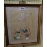 A set of four 20th Century framed Chinese flower paintings on silk - all with character text and red