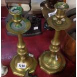 A pair of brass candlesticks