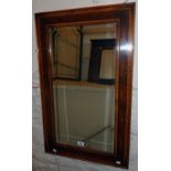 A Brights of Nettlebed polished yew and strung framed bevelled oblong wall mirror