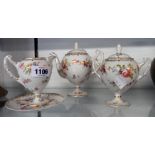 A small continental four piece tea set