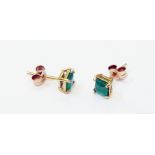 A pair of yellow metal emerald stud ear-rings