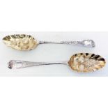 Two Georgian silver table spoons with later berry decoration