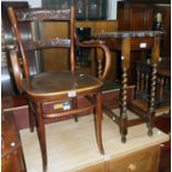 A late 19th Century bentwood elbow chair - a/f - sold with an oak barley twist occasional table