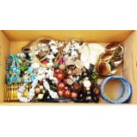 A box containing a quantity of assorted costume jewellery necklaces and bracelets