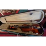 A cased modern Palatino child's 1/2 size violin, with bow - a/f