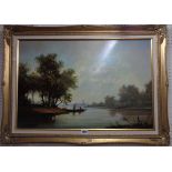 †M. Jeffries: an ornate gilt framed oil on panel, depicting a river view with figures in a punt