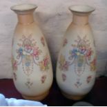 A pair of Crown Devon bottle vases