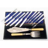 A part set of silver handled dessert knives and forks - sold with part cased pair of silver plated