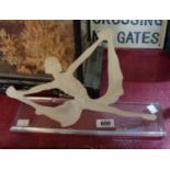 A frosted resin and clear perspex Art Deco style dancing figure