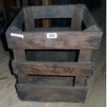A wood and wire cider crate stamped S.V.W. and other text