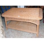 A 3' 1" modern wicker two tier coffee table