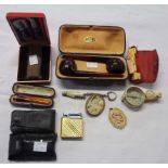 A Ronson cigarette lighter, a boxed Colibri lighter, amber cigar holder with 9ct. gold collar, a set
