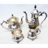 A four piece silver plated tea set with engraved decoration