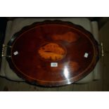 A 22 1/2" Edwardian style inlaid oval tea tray with shell motif and flanking brass handles