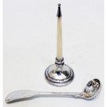 A silver and mother-of-pearl ring holder - sold with a silver spice sifter ladle