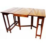A 36" early 20th Century cherry wood topped metamorphic folding table with flush brass hinges, set