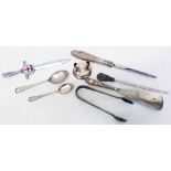 A pair of silver sugar tongs and small stand - sold with a silver handled shoe horn, etc.