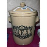 A stoneware bread crock