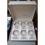 A boxed set of eight Daum crystal brandy glasses - sold with a similar smaller set