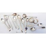 Two silver napkin rings, antique and later silver teaspoons, sugar tongs and a plated sifter spoon
