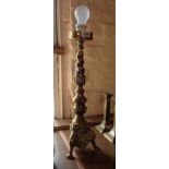 A cast brass column candlestick converted to table lamp