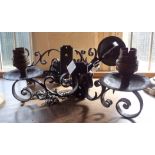 Three matching wrought iron wall lights